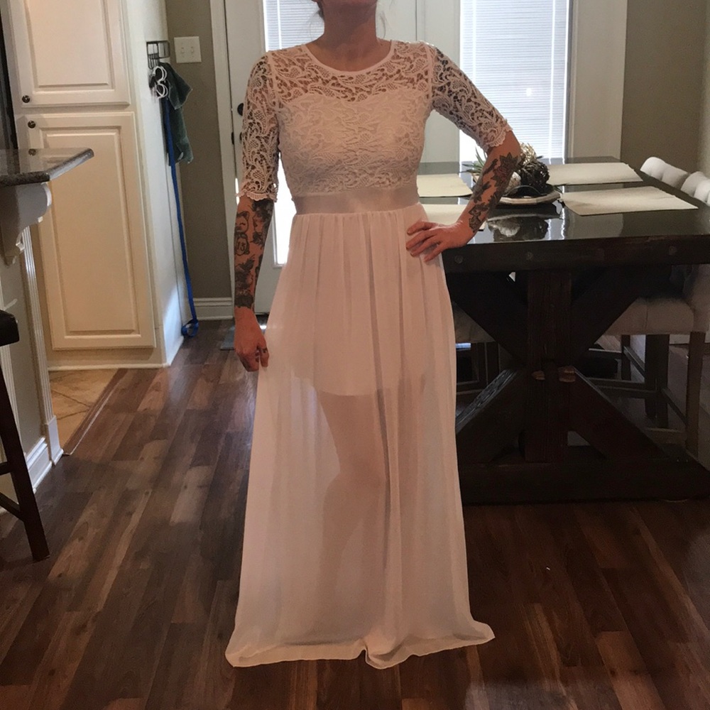 White wedding gown with three quarter sleeves